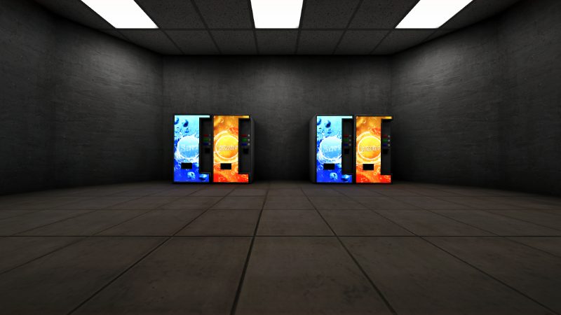 Two pairs of bright blue and orange vending machines against the back wall of a dark facility room